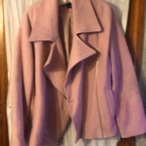 Love this jacket, is powder pink and zips across the chest. Very unique & warm